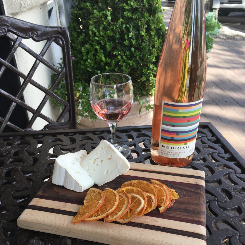 Enjoy a class of Red Car Rosé of Pinot Noir Syrah with your favorite cheeses and dried fruit on the patio at Molto Formaggio, or step inside and take a private class to learn about wine and cheese pairings.